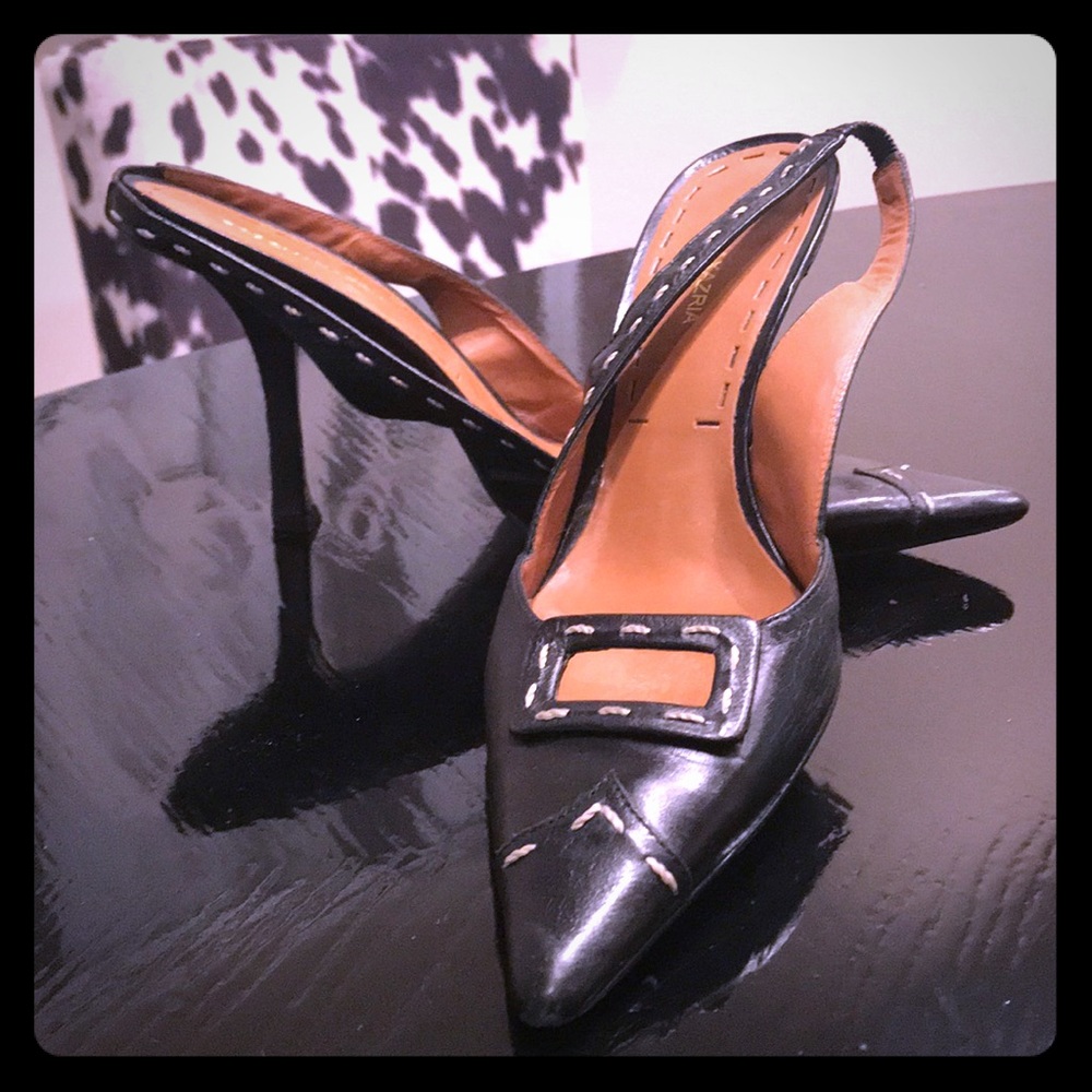 Stitch detail black slip on heels.